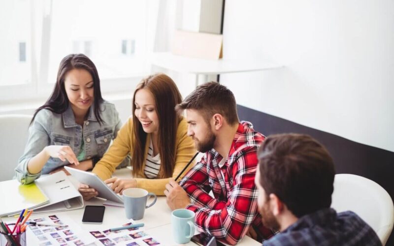 photo-editors-with-digital-tablet-in-meeting-room.jpg