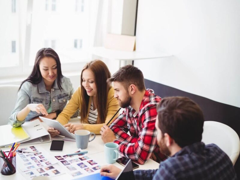 photo-editors-with-digital-tablet-in-meeting-room.jpg